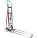 A silver Magliner hand truck with red wheels.
