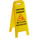 A yellow Carlisle wet floor sign with black text reading "Caution Wet Floor" on a white background.