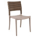A Grosfillex Java taupe resin sidechair with wicker back.