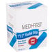 A white box of blue Medique woven adhesive strips.