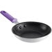 A Choice 7" aluminum non-stick fry pan with a purple silicone handle.