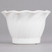 A white Cambro swirl bowl with wavy edges.