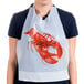 A woman wearing a Royal Paper disposable lobster bib.