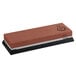 A brown rectangular Mercer Culinary combination sharpening stone with black base.