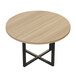 A Safco Mirella round wooden conference table with black legs.