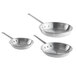 A group of silver Vollrath Arkadia frying pans.