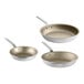 A close-up of three Vollrath Wear-Ever aluminum non-stick frying pans with chrome plated handles.