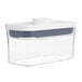 A clear plastic OXO food storage container with a white lid.