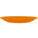An orange International Tableware stoneware plate with a rolled edge on a white background.