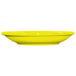 A yellow International Tableware saucer on a white background.
