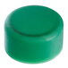 A close-up of a green round cap.