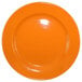 An orange International Tableware Cancun stoneware plate with a white background.