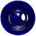 A cobalt blue stoneware bowl with a white rim.