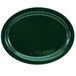 A dark green oval platter with a black rim.