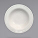 An International Tableware Newport ivory stoneware bowl with an embossed rim.