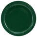 A close-up of a green International Tableware Cancun stoneware plate with a narrow rim.