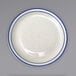 An ivory stoneware plate with blue bands on the rim.