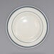 An International Tableware Catania stoneware pasta bowl in ivory with blue lines.
