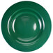 A close-up of a green stoneware deep rim bowl with a circular edge.