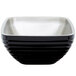 A black and silver Vollrath square serving bowl with a silver rim.