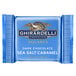 A blue package of Ghirardelli Dark Chocolate Sea Salt Caramel Squares.