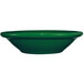 A green International Tableware stoneware bowl.
