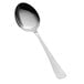 A close-up of a Vollrath Queen Anne stainless steel serving spoon with a long silver handle.