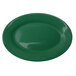 A green oval International Tableware platter.