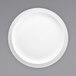 A white International Tableware porcelain plate with a narrow rim.