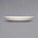 An ivory stoneware saucer with a small rim on a white surface