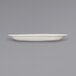 An ivory stoneware platter with a narrow rim on a white surface.