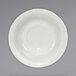 An International Tableware ivory stoneware saucer with an embossed pattern.