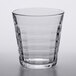 A Duralex clear glass tumbler with a ribbed rim.