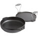 Two Lodge black cast iron pans with handles.