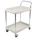 A gray Metro utility cart with two deep shelves and wheels.