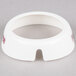 A white circular Tablecraft plastic collar with red "Fat Free" text.