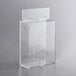A clear plastic box with a clear lid containing an AmerCare Royal Medium Hairnet Dispenser.