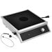 A black and silver Vollrath High-Power 4-Series induction range on a countertop.