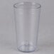 A Carlisle clear plastic tumbler with a lid on it.