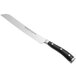 A Wusthof Classic Ikon bread knife with a black handle.