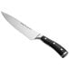A Wusthof Classic Ikon chef's knife with a black handle and silver blade.