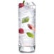 A glass of ice water with fruit made using Manitowoc IYT0420W ice cubes.