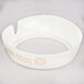 A white plastic Tablecraft salad dressing dispenser collar with beige lettering that reads "Fat Free 1000 Island"