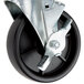A close-up of a black and silver Polypropylene swivel stem caster wheel with a metal nut and bolt.