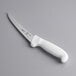 A Mercer Culinary Ultimate White curved boning knife with a white handle.