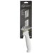 A Mercer Culinary Ultimate White 6" Curved Boning Knife in a package.