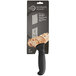 A Mercer Culinary Ultimate White 6" Offset Wavy Bread Knife with a black handle.