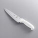A Mercer Culinary Ultimate White® chef knife with a white handle.