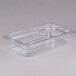 A clear plastic food pan with a clear bottom.