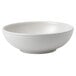 A white Dudson stoneware rice bowl with a curved edge.